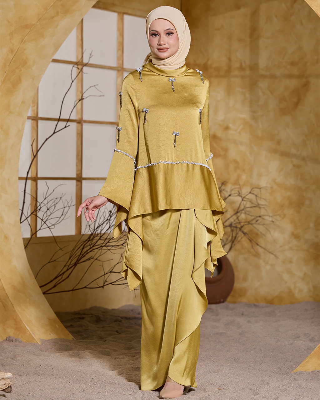 ALAIA IN GOLDEN YELLOW