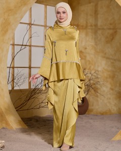 ALAIA IN GOLDEN YELLOW
